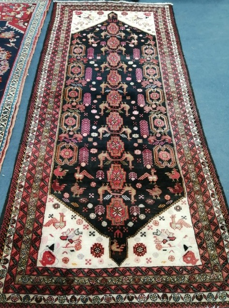 A Turkish hall carpet 275 x 130cm
